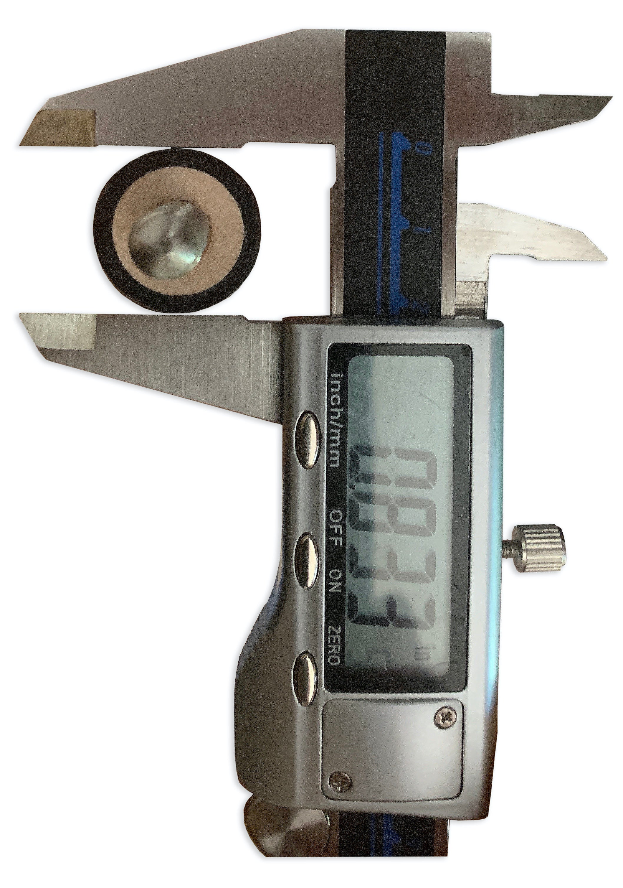 Side view of calipers measuring diameter of pool cue, showing 0.833 on digital scale